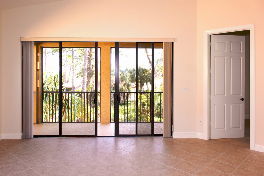 vertical blinds for sliding doors fold away neatly